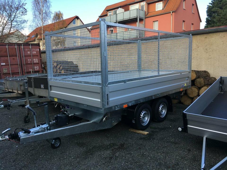 Agados car trailer with three-sided tipping bed and mesh lattice top, new; loading area 3.30 x 1.70 m