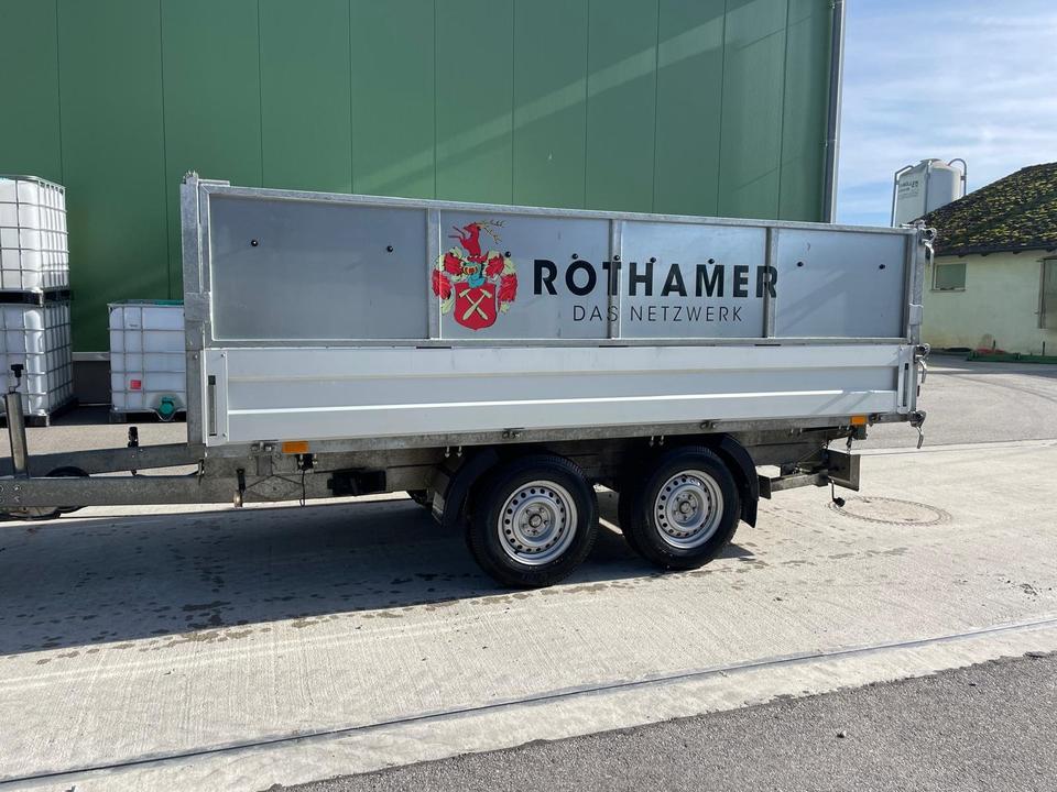 Trailer, tandem-axle tipper, three-sided tipping trailer