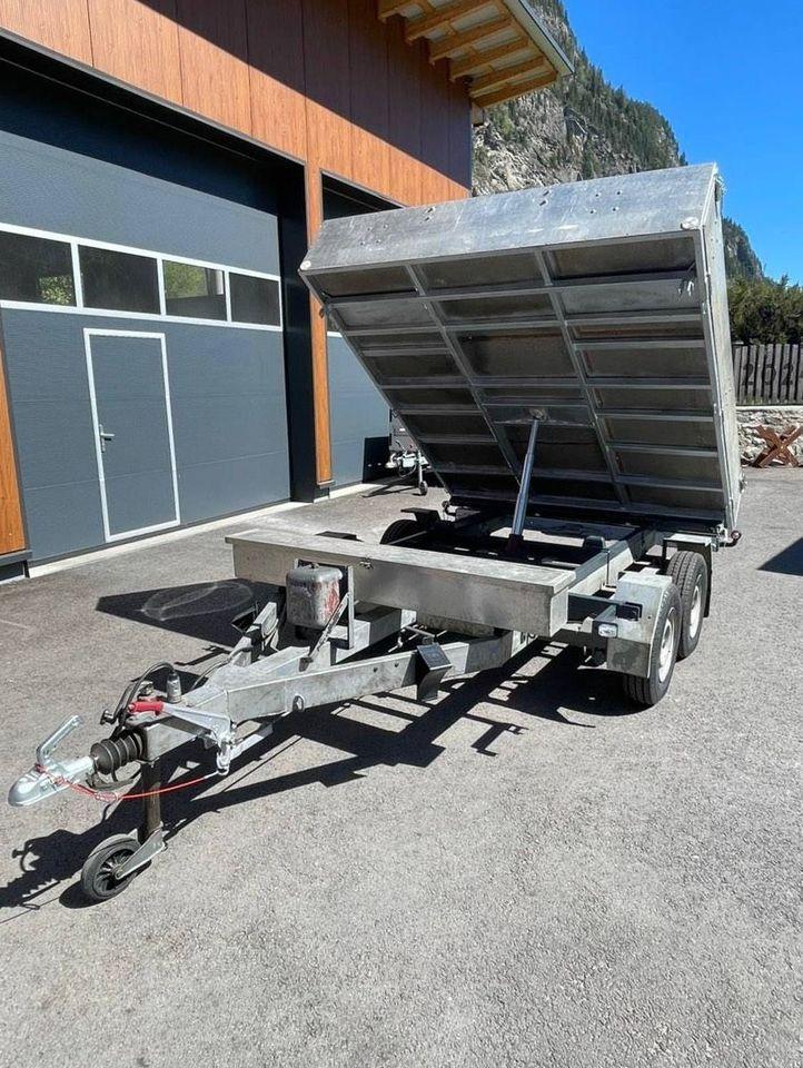 Tandem Three-Sided Tip Trailer with Side Walls, Livestock Ramp, and Tarpaulin Cover