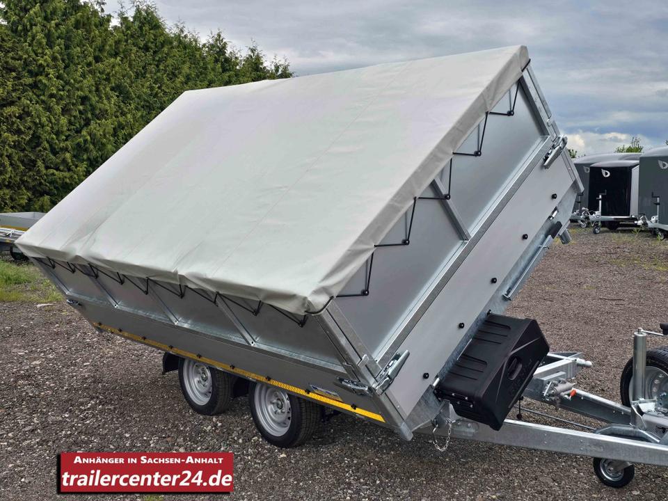 Electric 3.5t three-sided tipping trailer - bed 3.30 x 1.80 m with rails, emergency hand pump, lattice side gates, 60 cm storage box, tarpaulin, supports, spare wheel and shock absorbers