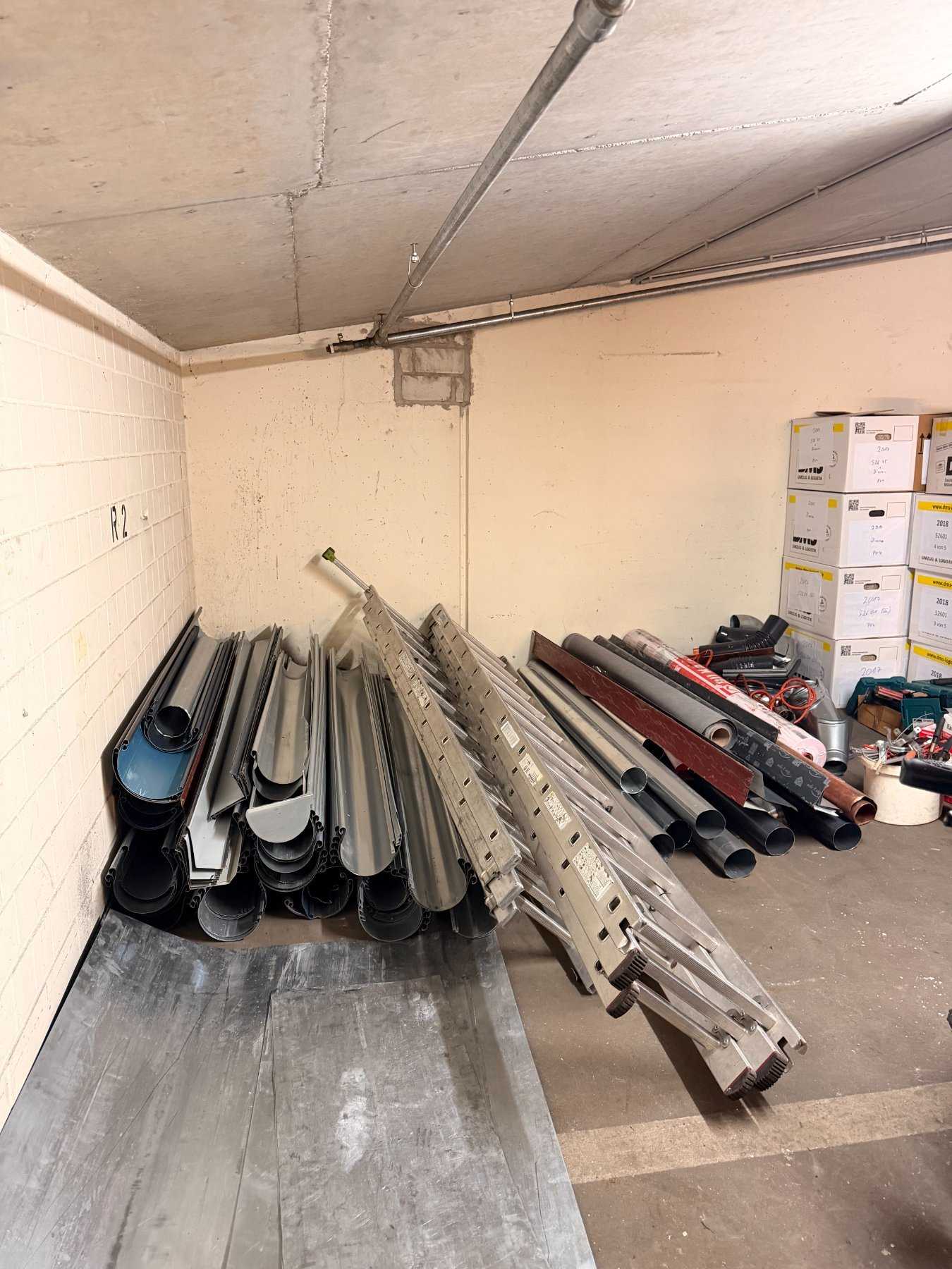 351-piece collection of assorted roof gutters and related materials, used