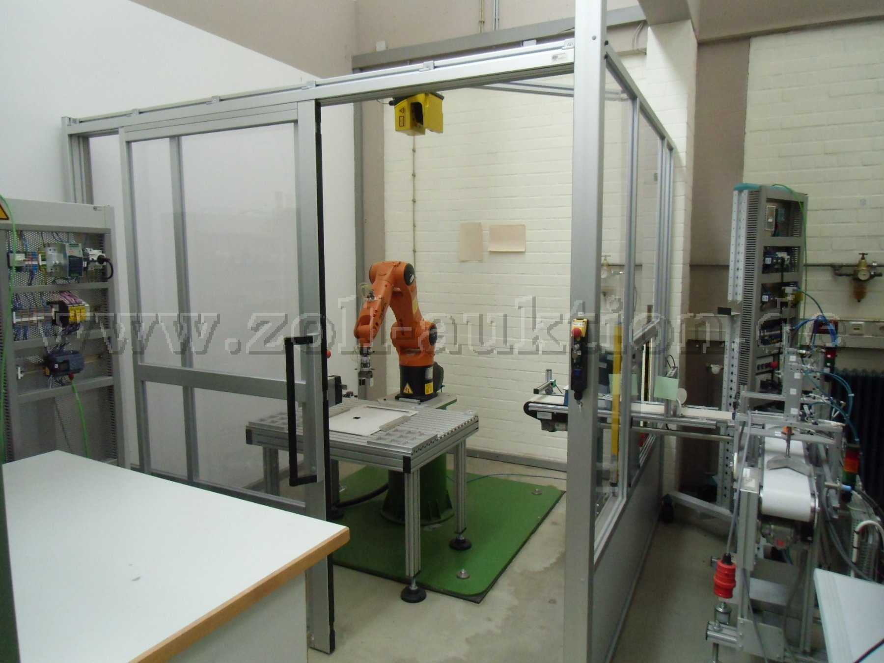 KUKA KR 6 R900 sixx six-axis robot with safety cell